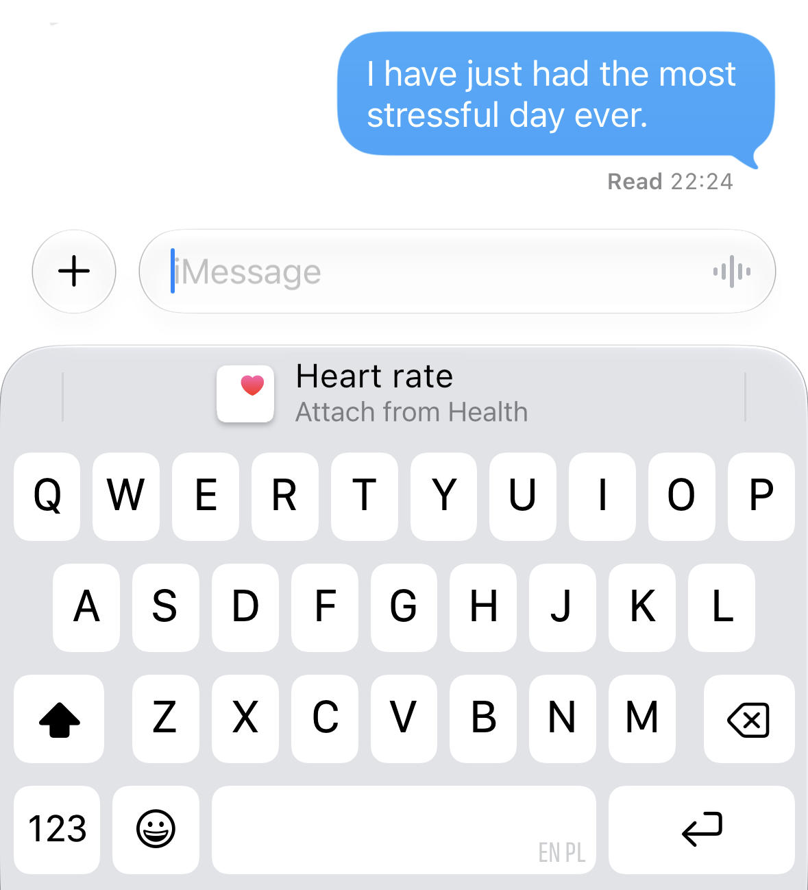 An iMessage saying 'I have just had the most stressful day ever.' with a proactive suggestion to attach heart rate data from Health above the keyboard.